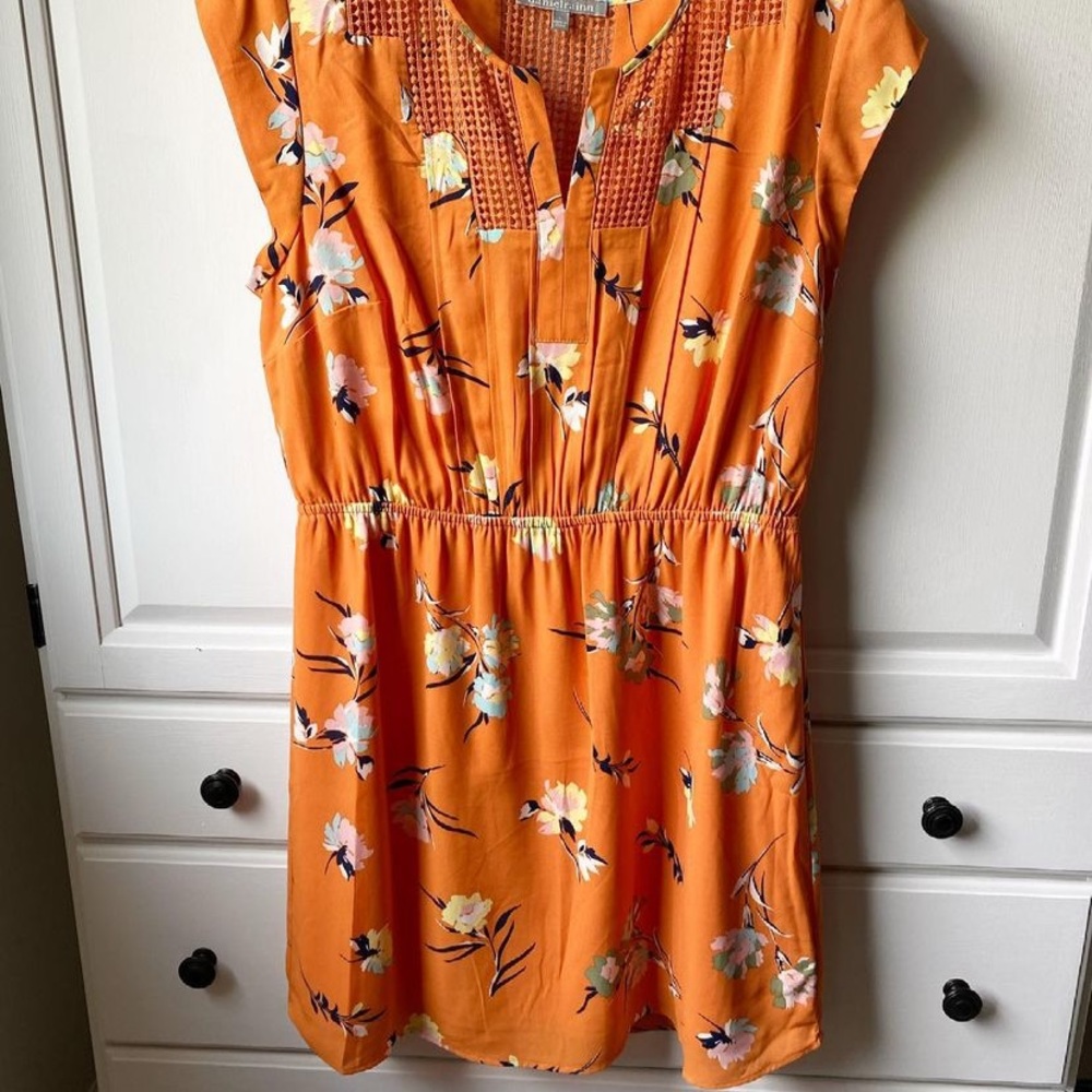 Orange floral mini dress with neck detail